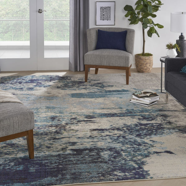 HomeRoots 9' Ivory Abstract Power Loom Area Rug - Modern Durable Design for Living Rooms & Bedrooms 10' X 14' 521890