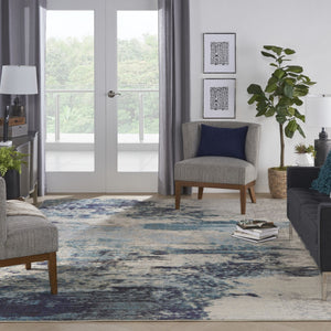 HomeRoots 9' Ivory Abstract Power Loom Area Rug - Modern Durable Design for Living Rooms & Bedrooms 10' X 14' 521890