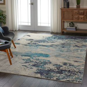 HomeRoots 9' Ivory Abstract Power Loom Area Rug - Modern Durable Design for Living Rooms & Bedrooms 7' X 10' 521891