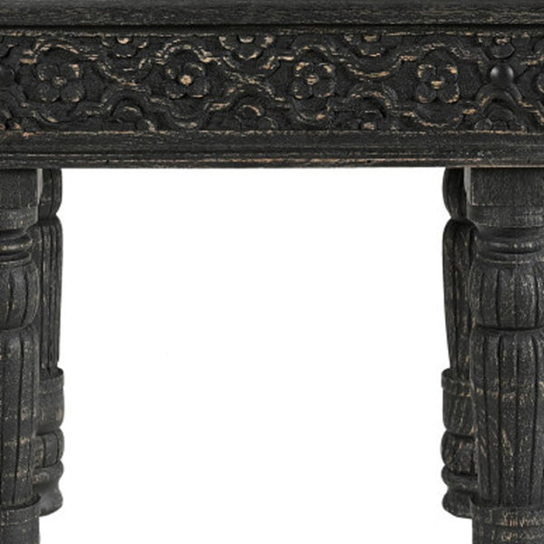 HomeRoots 24" Black Distressed Solid Wood End Table - Rustic Charm with Intricate Carvings for Versatile Use 521959