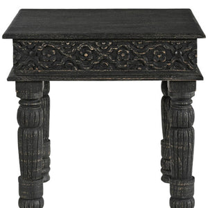 HomeRoots 24" Black Distressed Solid Wood End Table - Rustic Charm with Intricate Carvings for Versatile Use 521959
