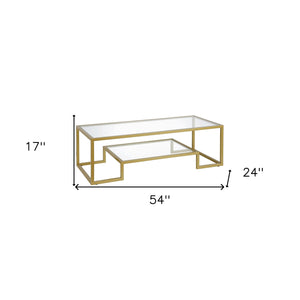 Homeroots 54" Clear And Gold Glass And Steel Coffee Table With Shelf   521997