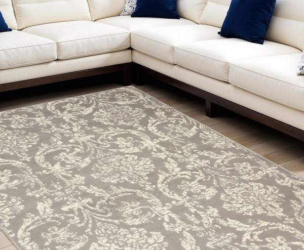 Homeroots 6' X 9' Gray And Ivory Damask Power Loom Distressed Area Rug  Polypropylene 522189