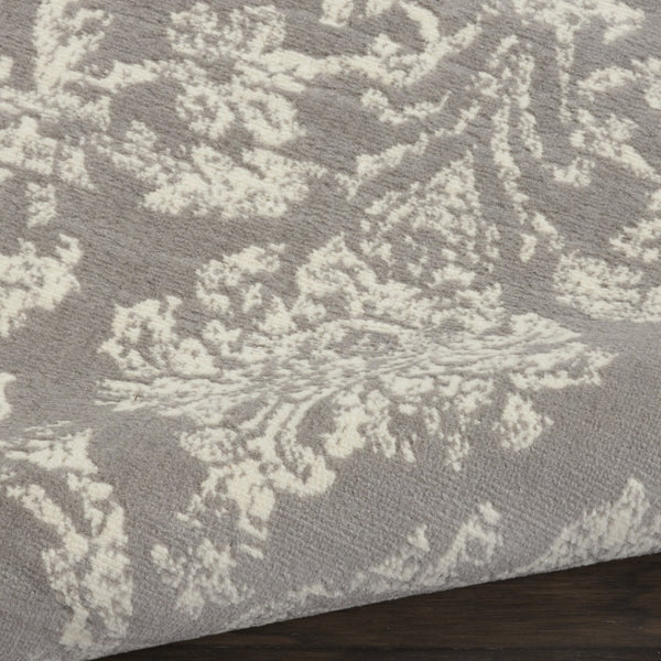 HomeRoots 6' Gray and Ivory Damask Area Rug - Elegant Power Loomed Design with Distressed Vintage Charm 8' X 10' Rectangle 522190