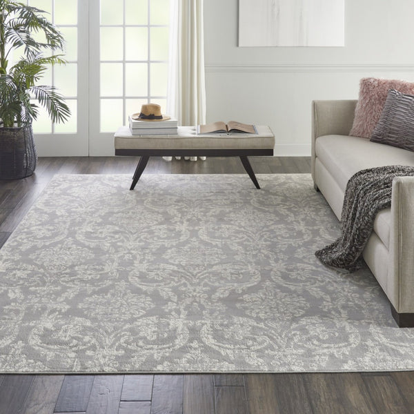 HomeRoots 6' Gray and Ivory Damask Area Rug - Elegant Power Loomed Design with Distressed Vintage Charm 8' X 10' Rectangle 522190