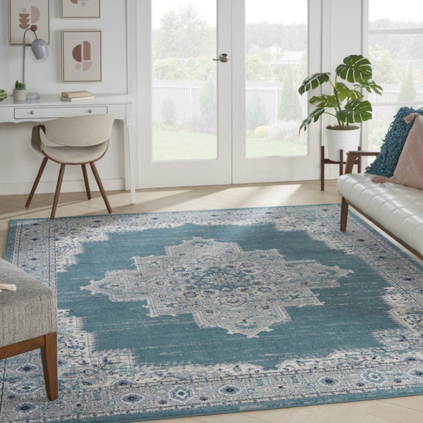 HomeRoots 8' Aqua Floral Power Loomed Area Rug – Vintage-Inspired, Distressed Design for Elegant Spaces 8' X 10' 522431