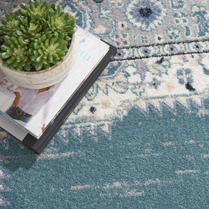 HomeRoots 8' Aqua Floral Power Loomed Area Rug – Vintage-Inspired, Distressed Design for Elegant Spaces 8' X 10' 522431