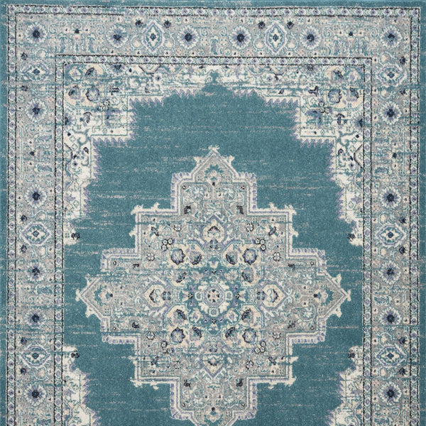 Homeroots 5' X 7' Aqua Floral Power Loom Distressed Area Rug  Polypropylene 522432