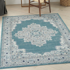 HomeRoots 8' Aqua Floral Power Loomed Area Rug – Vintage-Inspired, Distressed Design for Elegant Spaces 5' X 7' 522432