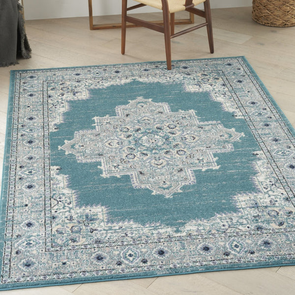 HomeRoots 8' Aqua Floral Power Loomed Area Rug – Vintage-Inspired, Distressed Design for Elegant Spaces 5' X 7' 522432