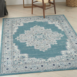 Homeroots 5' X 7' Aqua Floral Power Loom Distressed Area Rug  Polypropylene 522432