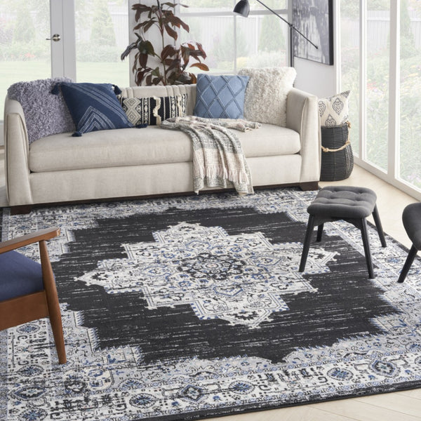 HomeRoots 8' Black Floral Power Loom Area Rug - Timeless Elegance with Distressed Charm for Any Space 8' X 10' 522456