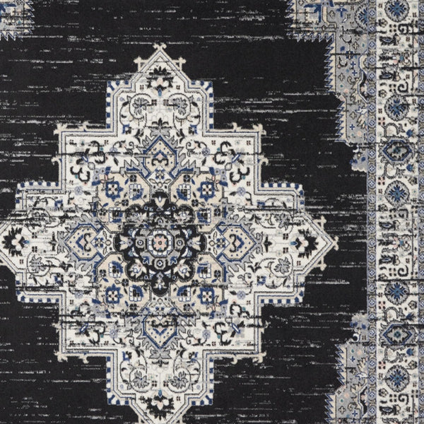 Homeroots 8' X 10' Black Floral Power Loom Distressed Area Rug  Polypropylene 522456