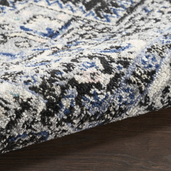 HomeRoots 8' Black Floral Power Loom Area Rug - Timeless Elegance with Distressed Charm for Any Space 5' X 7' 522457