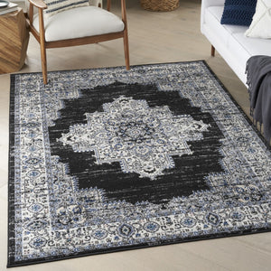 HomeRoots 8' Black Floral Power Loom Area Rug - Timeless Elegance with Distressed Charm for Any Space 5' X 7' 522457