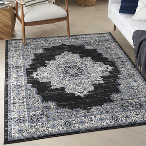 Homeroots 5' X 7' Black Floral Power Loom Distressed Area Rug  Polypropylene 522457