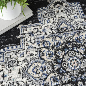 Homeroots 5' X 7' Black Floral Power Loom Distressed Area Rug  Polypropylene 522457