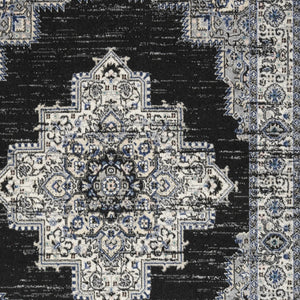 Homeroots 5' X 7' Black Floral Power Loom Distressed Area Rug  Polypropylene 522457