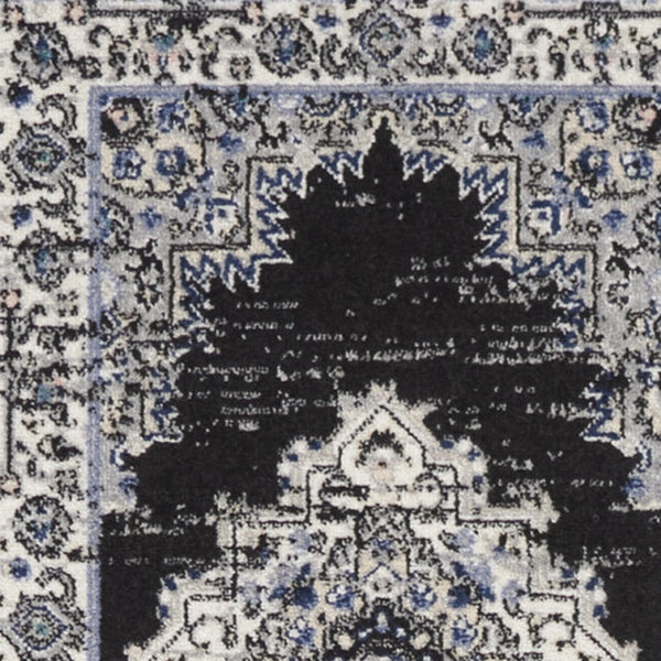 Homeroots 10' Runner Black And Ivory Floral Power Loom Distressed Runner Rug  Polypropylene 522459