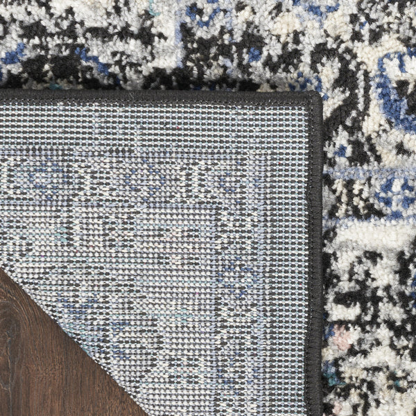 Homeroots 10' Runner Black And Ivory Floral Power Loom Distressed Runner Rug  Polypropylene 522459