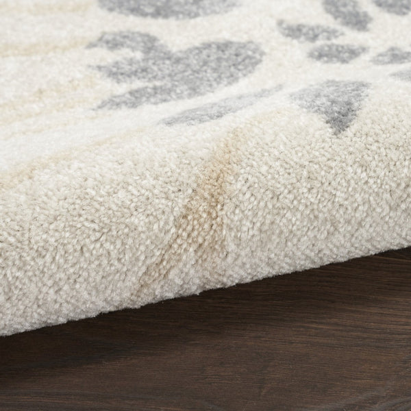 HomeRoots 5' Cream Floral Power Loom Area Rug - Timeless Distressed Design for Modern or Traditional Spaces 5' X 7' 522512