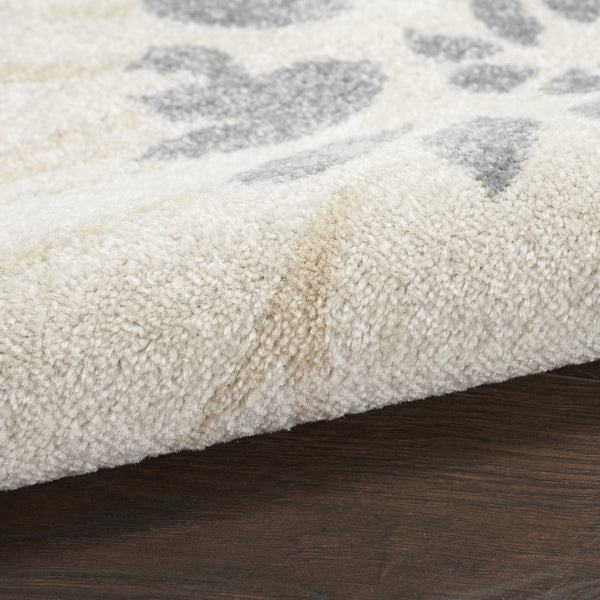 Homeroots 5' X 7' Cream Floral Power Loom Distressed Area Rug  Polypropylene 522512