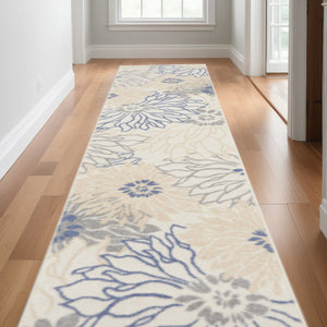 Homeroots 10' Runner Ivory And Blue Floral Power Loom Distressed Runner Rug  Polypropylene 522514