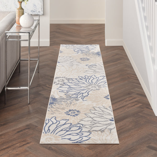 Homeroots 10' Runner Ivory And Blue Floral Power Loom Distressed Runner Rug  Polypropylene 522514