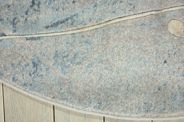 Homeroots 6' Blue Round Floral Power Loom Area Rug  Polyester 522605