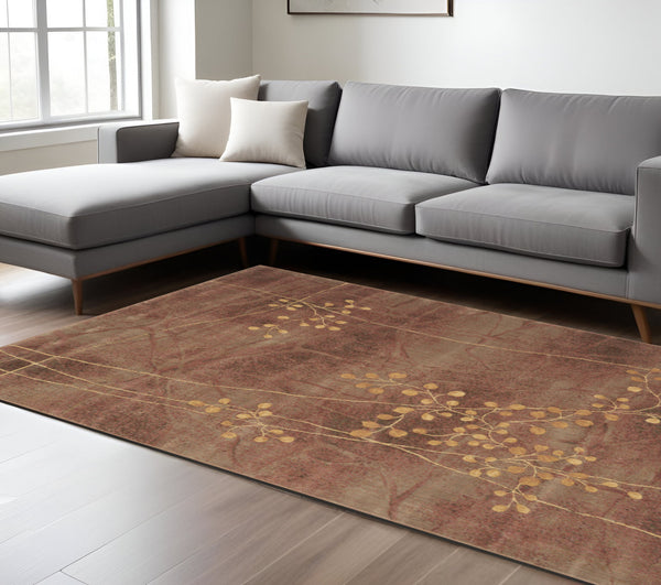 Homeroots 8' X 11' Brown Floral Power Loom Non Skid Area Rug  Polyester 522611