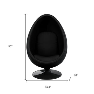 HomeRoots 35" Black Fiberglass Swivel Egg Chair with Wool Upholstery & Pillows for Modern Spaces & Comfort 522846