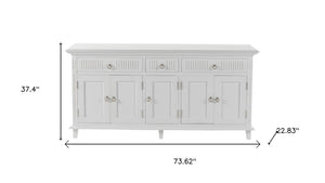 HomeRoots 74" Antiqued White Solid Wood Buffet Table - Stylish Storage Solution with Drawers & Doors! 523209