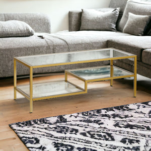 Homeroots 45" Gold Glass And Steel Coffee Table With Two Shelves   523329