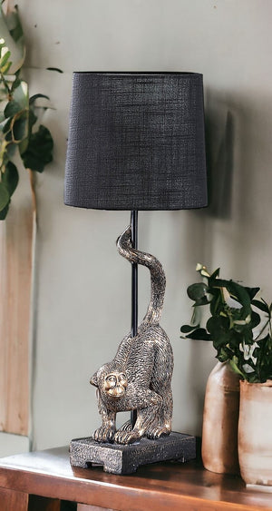 Homeroots 24" Antiqued Gold Monkey Table Lamp With Black Drum Shade Black  524263