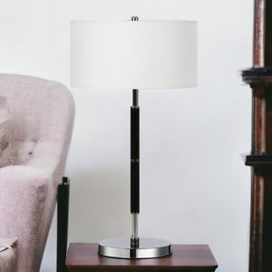 Homeroots 25" Black And Silver Metal Two Light Table Lamp With White Drum Shade   524305