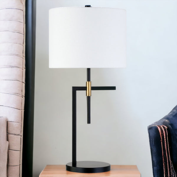 Homeroots 25" Black And Gold Metal Table Lamp With White Drum Shade   524424