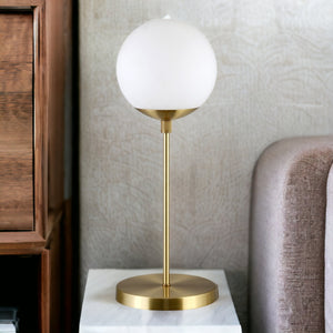 Homeroots 21" Brass Metal Globe Table Lamp With Clear Globe Shade   524466