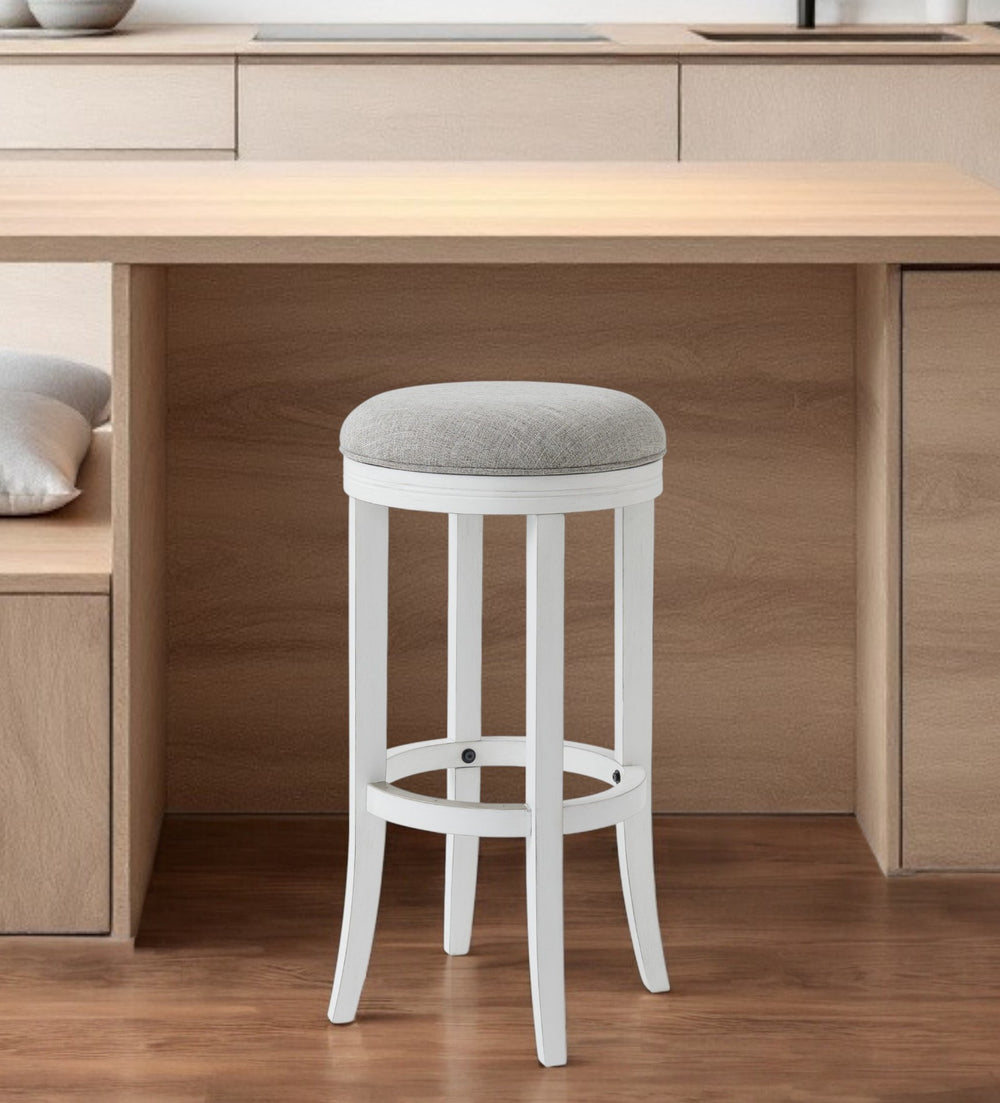 Homeroots 30" Gray And Antiqued White Solid Wood Swivel Backless Bar Height Bar Chair   524529