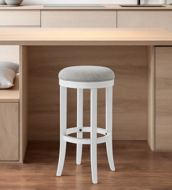 Homeroots 30" Gray And Antiqued White Solid Wood Swivel Backless Bar Height Bar Chair   524529