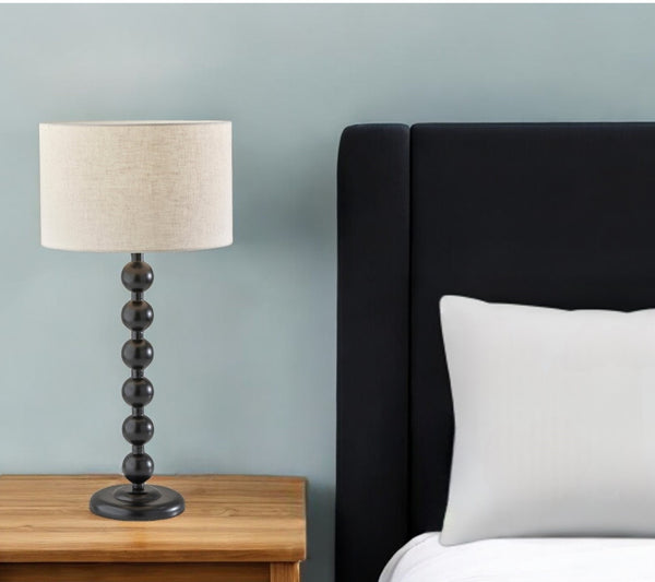 Homeroots 28" Black Solid Wood Candlestick Table Lamp With Off White Drum Shade   524631