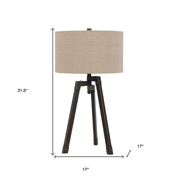 HomeRoots 32" Charcoal Metal Tripod Table Lamp with Tan Linen Shade - Stylish Ambient Lighting for Any Space 524695