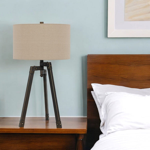HomeRoots 32" Charcoal Metal Tripod Table Lamp with Tan Linen Shade - Stylish Ambient Lighting for Any Space 524695
