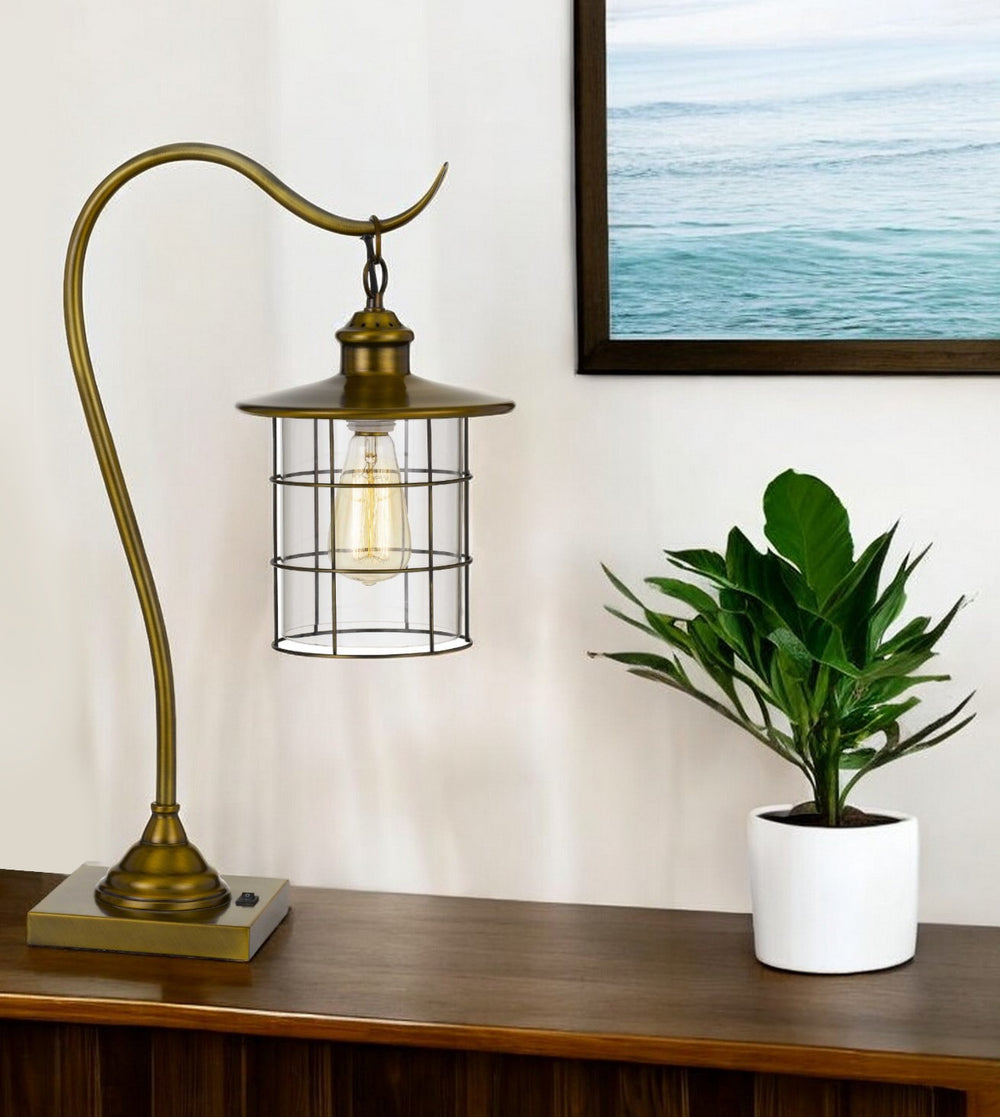 Homeroots 25" Antiqued Brass Metal Lantern Desk Lamp With Antiqued Brass Drum Shade   524696