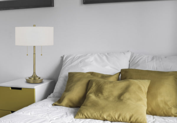 Homeroots 20" Antiqued Brass Metal Two Light Table Lamp With White Drum Shade   524727