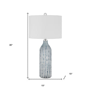 HomeRoots 30" Gray and Aqua Hand-Blown Glass Table Lamp with White Drum Shade for Coastal Chic Decor 524735
