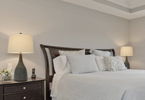 HomeRoots 29" Elegant Black Ceramic Table Lamp with Beige Shade for Stylish Lighting in Any Room 524746