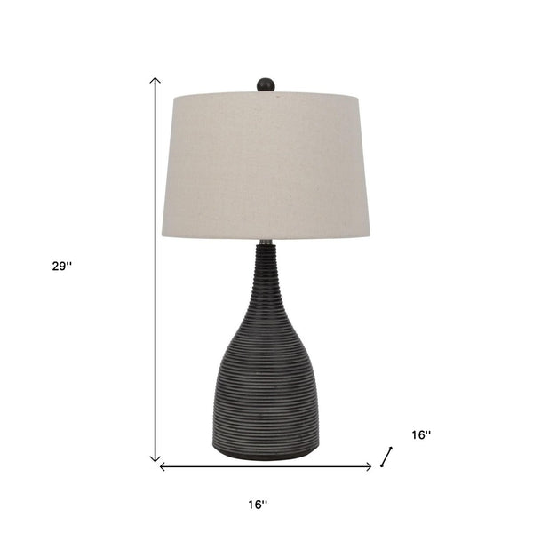 HomeRoots 29" Elegant Black Ceramic Table Lamp with Beige Shade for Stylish Lighting in Any Room 524746