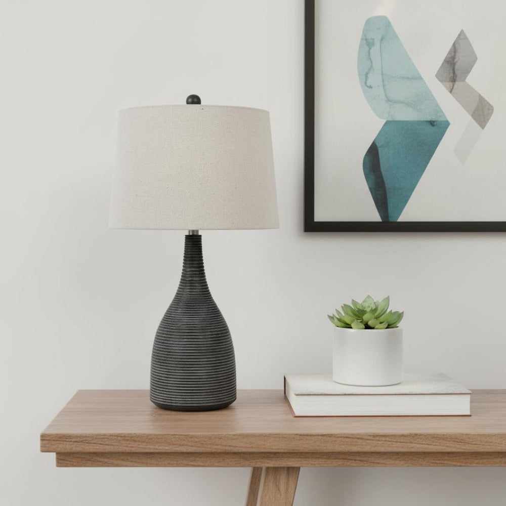 HomeRoots 29" Elegant Black Ceramic Table Lamp with Beige Shade for Stylish Lighting in Any Room 524746
