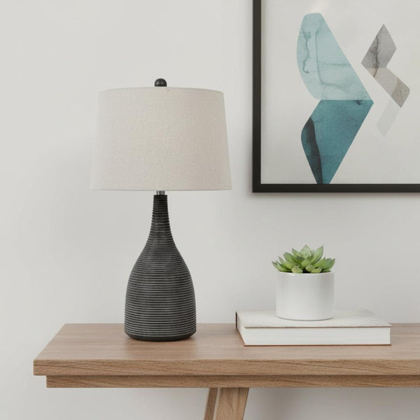 HomeRoots 29" Elegant Black Ceramic Table Lamp with Beige Shade for Stylish Lighting in Any Room 524746