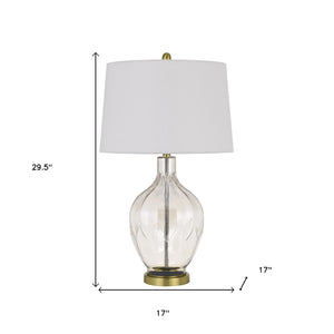 HomeRoots 30" Clear Metal Table Lamp - Modern Elegance with Off-White Drum Shade for Any Room Ambiance 524782